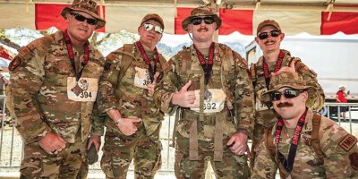 U.S. Air National Guard Airmen assigned to the 184th Logistics Readiness Squadron traverse the high-desert terrain of the White Sands Missile Range, N.M., during the 37th Annual Bataan Memorial Death March, March 21, 2026.