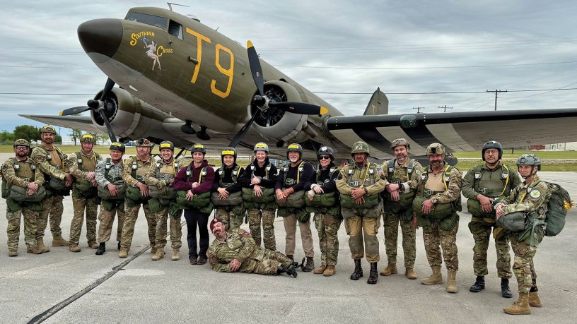 Jon Harmon (front) and members of the Liberty Jump Team pose in front of the C-49J Southern Cross in Corsicana, Texas, in April 2026. The team completed a basic and airborne refresher course to prepare for commemorative parachute jumps into Normandy, France, marking the 82nd anniversary of D-Day. (Contributed photo)