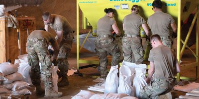 Wisconsin National Guard Soldiers assigned to the 32nd Infantry Brigade Combat Team prepare and palletize sandbags at the Columbia County Highway Department facility in Wyocena, Wisconsin, April 16, 2026. The operation was part of a 13-day state activation during which 83 service members assigned to Task Force-Sandman contributed to flood mitigation efforts in Southern Wisconsin resulting from a series of record setting April storms. (U.S. National Guard photo by Paul Gorman)