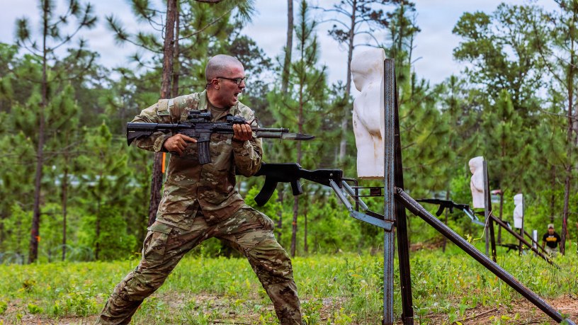 A U.S. Army Ranger Course student from Class 06-26 attacks an upright enemy target on the new Bayonet Assault Course during the Ranger Assessment Phase (RAP) April 21, 2026, at Fort Benning, Georgia. The quarter-mile course is a recent addition to the Malvesti Obstacle Course and was designed to rapidly instill grit and violence of action, preparing Rangers to close with and destroy the enemy in contested environments where modern technology may fail. (U.S. Army photo by Joey Rhodes II)