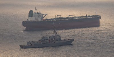 Arleigh Burke-class guided-missile destroyer USS Rafael Peralta (DDG 115) enforces a maritime blockade against an Iranian-flagged ship attempting to sail toward an Iranian port, April 24, 2026. (U.S. Navy photo)