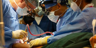 U.S. Air Force Lt. Col. Anders Davidson, left, vascular surgeon assigned to the Lesser Antilles Medical Assistance Team (LAMAT) 2026 mission, performs surgery on a 16-year-old Saint Lucian patient at Owen King European Union Hospital in Castries, Saint Lucia, April 27, 2026.