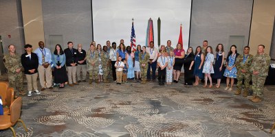 Awardees and nominees for Volunteer of the Year gather for a photo at the Volunteer of the Year Recognition Ceremony April 29, 2026, at Club Stewart on Fort Stewart, Georgia. Over the last year, nearly 400 volunteers recorded 32,856.25 hours of service in the Volunteer Management Information System. The estimated amount of money saved by the Army because of the work of volunteers is $1,143,068.94. (U.S. Army Photo by Chris Rich)