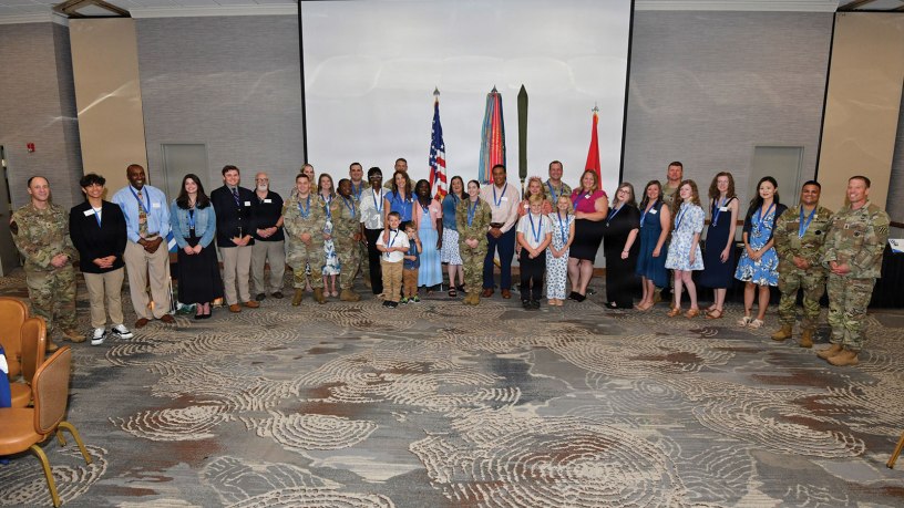 Awardees and nominees for Volunteer of the Year gather for a photo at the Volunteer of the Year Recognition Ceremony April 29, 2026, at Club Stewart on Fort Stewart, Georgia. Over the last year, nearly 400 volunteers recorded 32,856.25 hours of service in the Volunteer Management Information System. The estimated amount of money saved by the Army because of the work of volunteers is $1,143,068.94. (U.S. Army Photo by Chris Rich)