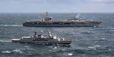 Argentine Navy Almirante Brown-class destroyers ARA La Argentina (DD 11) and ARA Sarandi (D 13) steam alongside U.S. Navy Nimitz-class aircraft carrier USS Nimitz (CVN 68) during a bilateral maritime engagement in the Atlantic Ocean, April 29, 2026.