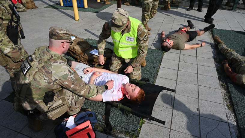 Firefighters assigned to U.S. Army Garrison Italy take part in a mock earthquake emergency response exercise at the Golden Lion Conference Center on Caserma Ederle, April 29, 2026. The exercise tested and validated Italian and American joint force protection and emergency management procedures in response to a simulated earthquake emergency. (U.S. Army photo by Graigg Faggionato)