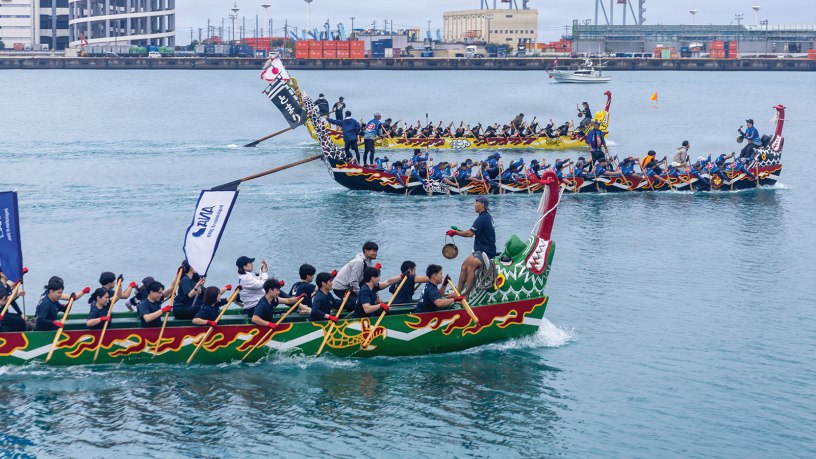 The Army Black Knights race in the yellow dragon boat during their heat at the Naha Haarii dragon boat races at Naha Port, Okinawa, Japan, May 5, 2026.