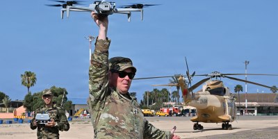 U.S. Army Sgt. 1st Class Brent Ottinger, an instructor assigned to 7th Army Training Command Combined Arms Training Center, demonstrates a landing technique during proficiency demonstration training on an unmanned aerial system with members of the Royal Moroccan Air Force during the inaugural African Lion 26 drone academics at Southern Zone Headquarters, Agadir, Morocco, May 4, 2026.