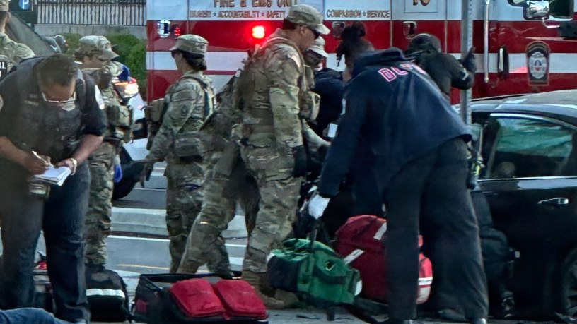 U.S. Army Soldiers with the Florida National Guardsmen with Joint Task Force District of Columbia, in support of the DC Safe and Beautiful mission, assist the interagency partners in providing to injured car passengers at the intersection of 15th Street and Constitution Avenue in Washington, May 5, 2026. (U.S. Air National Guard photo by Staff Sgt. Noah Carlson)