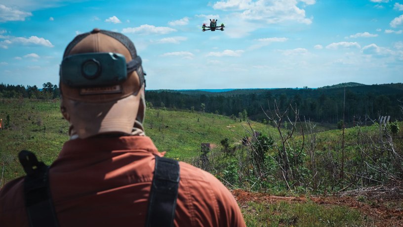 An Unmanned Aerial Vehicle (UAV) drone operator assigned to 1st Special Forces ommand (Airborne) pilots a UAV at a counter- drone range in Ellerbe, North Carolina, May 5, 2026. This range was conducted to test Soldiers on precise execution of UAVs targets in vast combat areas. (U.S. Army photo by Ssg. Gabriel E. Davis)
