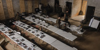 U.S. Marines with 7th Communication Battalion and III Marine Expeditionary Force Support Battalion, both with III MEF Information Group, set up a combat operations center during Kaiju Rain 26 at Camp Hansen, Okinawa, Japan, May 9, 2026.