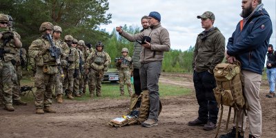 U.S. Soldiers assigned to the 68th Theater Medical Command and the 2d Cavalry Regiment receive instructions on how to properly utilize a medical vital sign monitoring device during an Autonomous Triage and Treatment Challenge taking place near Bemowo Piskie Training Area, Poland, May 10, 2026.