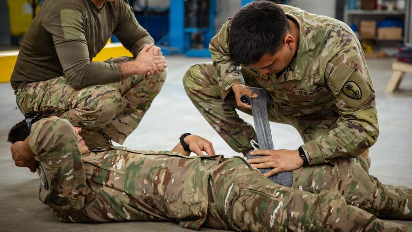 Pfc. Adahid Jimenez, a mechanic with the 603rd Military Police Company, applies a pressure dressing using the French Army’s technique at Tapa Army Base in Tapa, Estonia, May 11, 2026.