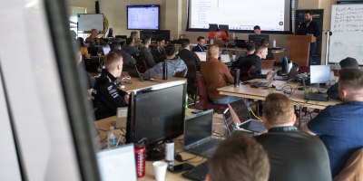 Participants of Cyber Yankee 2026 participate in a training exercise prior to the start of the practical exercise portion of the event at Camp Nett, Niantic, Conn. May 11, 2026. Cyber Yankee is the National Guard’s premier annual regional cyber training exercise, linking military cyber warriors with cyber experts from local utility companies to collaborate and train together on how to respond to credible cyber threats against these pieces of critical infrastructure.