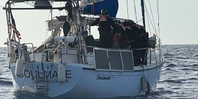 Special agents with the U.S. Coast Guard Investigative Service, supported by Coast Guard surface and aviation assets, conduct an offshore interdiction operation involving the sailing vessel Soulmate approximately 40 nautical miles off the coast of Melbourne, Florida. The operation is part of an ongoing criminal investigation into the disappearance of Lynette Hooker. (U.S. Coast Guard photo)