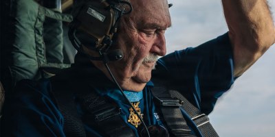 Soldiers assigned to 101st Combat Aviation Brigade "Wings of Destiny", 101st Airborne Division (Air Assault), support the visit of Korean War veteran Mr. Fred Forsyth, and Vietnam War Medal of Honor Recipients, Mr. Kenneth David and Mr. Michael Fitzmaurice, with an Honor Flight aboard a UH-60 Blackhawk Helicopter May 16, 2026, Fort Campbell, KY.