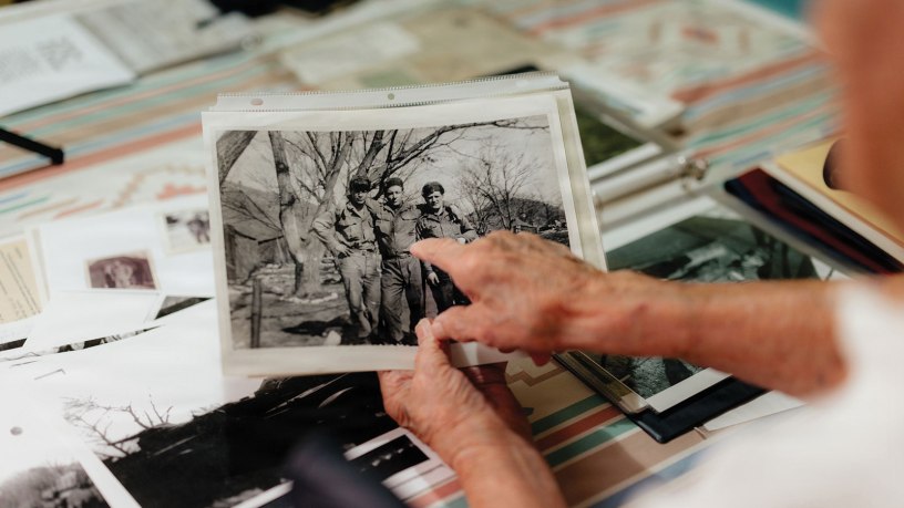Stanley Martinez, a 96-year-old Army Korean War veteran, holds a photo of his 7th Infantry Division tank crew during an interview at his home in El Centro, Calif., May 19, 2026.