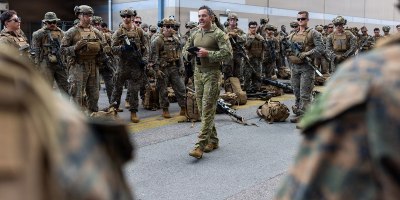 An Australian Army soldier with 5th Aviation Regiment briefs U.S. Marines with Alpha Company, 1st Battalion, 5th Marine Regiment, Marine Rotational Force – Darwin 26, at Royal Australian Air Force Base Townsville, Australia, May 19, 2026.