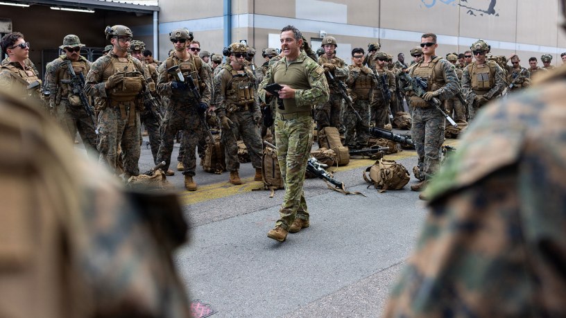 An Australian Army soldier with 5th Aviation Regiment briefs U.S. Marines with Alpha Company, 1st Battalion, 5th Marine Regiment, Marine Rotational Force – Darwin 26, at Royal Australian Air Force Base Townsville, Australia, May 19, 2026.