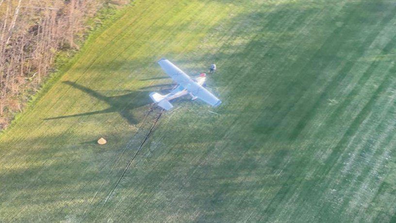 A crashed aircraft lays on the air strip of North Fox Island in Lake Michigan May 20, 2026. A Coast Guard Air Station Traverse City MH-60 Jayhawk aircrew transported two people in stable condition after launching and arriving on scene. (U.S. Coast Guard photo by Air Station Traverse City personnel)