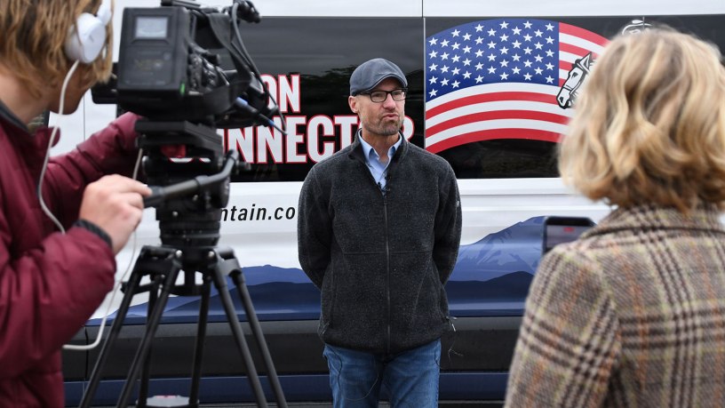 Dave Tookmanian, garrison strategic community liaison, discusses the new Carson Connector app-based ride share program with local media May 20, 2026. The service will offer hundreds of pre-selected pickup and drop-off locations throughout post and two off-post locations.