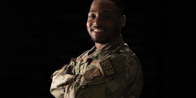 U.S. Air Force Staff Sgt. Jovan Berry, a base defense operations controller assigned to the 316th Security Forces Squadron, poses for a portrait at Joint Base Andrews, Maryland, May 21 2026. Earlier in May, Berry saved a man's life who was having a medical emergency at the Visitor Control Center. (U.S. Air Force photo by Senior Airman Daniel Walderbach)