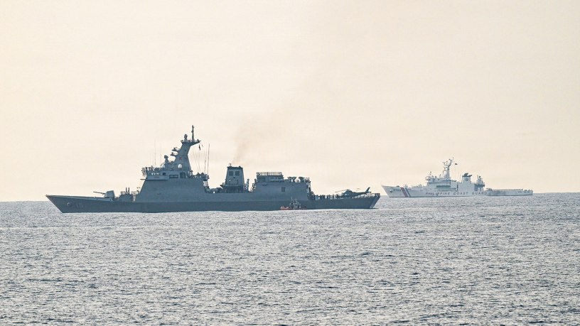 A U.S. Coast Guard 35-foot Long-Range Interceptor embarked cutter boat attached to Legend-class cutter USCGC Midgett (WMSL 757) sails alongside Philippine Navy BRP Antonio Luna (FFG-151) in support of a passenger transfer during the Maritime Cooperative Activity (MCA) in the Philippines’ Exclusive Economic Zone, May 28, 2026.