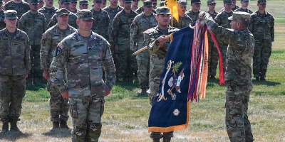 The Superior Unit Award streamer is attached to the organizational colors of the newly redesignated 1st Battalion, 163rd Infantry Regiment during a transformation ceremony at Fort Harrison, Montana, May 27, 2026. The award recognized the battalion’s exceptionally meritorious service during its 2021–2022 deployment to the U.S. Central Command area of operations. (Air National Guard photo by Senior Master Sgt. Devin Doskey)