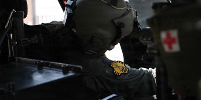 Lt. Col. Danielle Youngberg, HH-60G Pilot, 150th Special Operations Wing, prepares for the final New Mexico Air National Guard flight on the HH-60G Pave Hawk, Aug. 15, 2024. The HH-60G, and now the HH-60W Jolly Green II, serve as vital pillars in the Air Force Rescue enterprise. (New Mexico Air National Guard photo taken by Staff Sgt. Tyler Catanach)