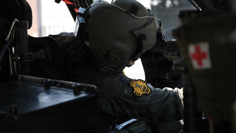Lt. Col. Danielle Youngberg, HH-60G Pilot, 150th Special Operations Wing, prepares for the final New Mexico Air National Guard flight on the HH-60G Pave Hawk, Aug. 15, 2024. The HH-60G, and now the HH-60W Jolly Green II, serve as vital pillars in the Air Force Rescue enterprise. (New Mexico Air National Guard photo taken by Staff Sgt. Tyler Catanach)