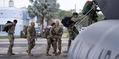 U.S. Airmen with the 156th Contingency Response Group board a C-17 Globemaster III assigned to the 105th Airlift Wing, New York Air National Guard, at Muñiz Air National Guard Base, Carolina, Puerto Rico, Jan. 31, 2025.
