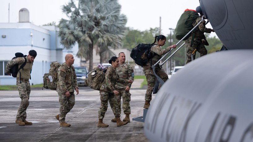 U.S. Airmen with the 156th Contingency Response Group board a C-17 Globemaster III assigned to the 105th Airlift Wing, New York Air National Guard, at Muñiz Air National Guard Base, Carolina, Puerto Rico, Jan. 31, 2025.