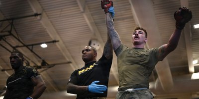 U.S. Army Sgt. Jeremiah Slagle (right), Ohio Army National Guard, competes in the finals during day three of the 2026 Lacerda Cup All-Army Combatives Championship at Fort Benning, Ga. Apr. 10, 2026.
