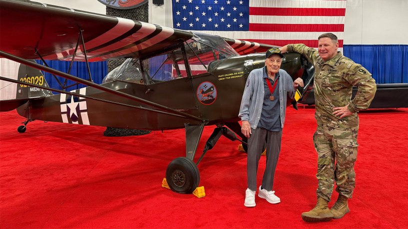 U.S. Army Reserve Brig. Gen. Stephen P. Case (right), commanding general of the 95th Training Division - Initial Entry Training, stands with World War II veteran Staff Sgt. Dominick Critelli next to a restored Taylorcraft L-2M Grasshopper liaison aircraft during the Army Aviation Warfighting Summit held April 15-17, 2026. (Courtesy photo)