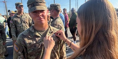 U.S. Army Pvt. 1st Class Mace Veit, 1st Battalion, 221st Cavalry, Nevada National Guard, is being pinned his airborne pin by his sister at Fort Benning, Georgia, April 17, 2026. Veit completed Ranger School, Airborne School, Air Assault School and Pathfinder School before his 20th birthday, accomplishing in less than six months what can take many Soldiers years to achieve. Courtesy photo.