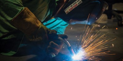 Construction Mechanic 1st Class Cameron Crayton, assigned to Naval Construction Battalion 14, practices arc welding at Naval Construction Battalion Center, Gulfport, during annual training (AT-3) for fiscal year 2026, quarter 3.