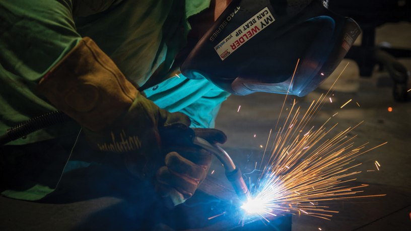 Construction Mechanic 1st Class Cameron Crayton, assigned to Naval Construction Battalion 14, practices arc welding at Naval Construction Battalion Center, Gulfport, during annual training (AT-3) for fiscal year 2026, quarter 3.