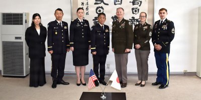 Leaders and personnel from the Japan Ground Self-Defense Force (JGSDF) Medical Service School and U.S. Army Medical Department Activity-Japan (MEDDAC-J) stand together for a group photo following an award ceremony at the JGSDF Medical Service School in Tokyo on May 18.