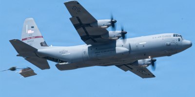 U.S. Air National Guard C-130 crew members from the 143d Airlift Wing conduct a heavy equipment drop as part of joint interfly operations conducted between the Rhode Island and Connecticut Air National Guard on May 19, 2026, at Westover Air Reserve Base, Mass.