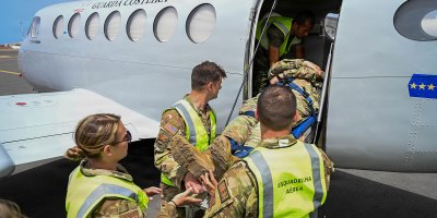 New Hampshire National Guard medical personnel and Cabo Verde Armed Forces Medical Unit members load a simulated patient aboard a C-12 Huron multipurpose aircraft assigned to the Cabo Verde Coast Guard Air Squadron during an aeromedical knowledge exchange in Praia, Cabo Verde, May 22, 2026.