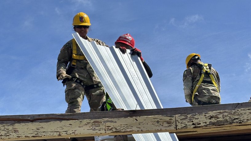 Soldiers assigned to the 797th and 871st Engineer Vertical Construction Companies support temporary roofing operations in Saipan, Commonwealth of the Northern Mariana Islands, following Super Typhoon Sinlaku, which struck the CNMI as a Category 4 storm on April 14.