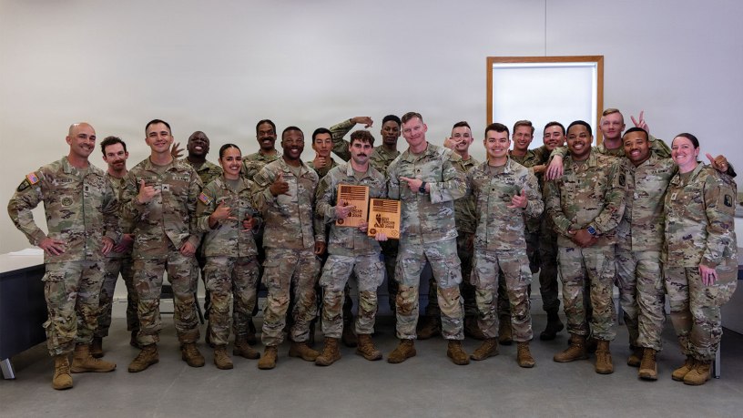 U.S. Army Soldiers pose for a group photo during the 2026 Spc. Hilda I. Clayton Best Combat Camera Competition at Fort McCoy, Wisconsin, May 27, 2026.