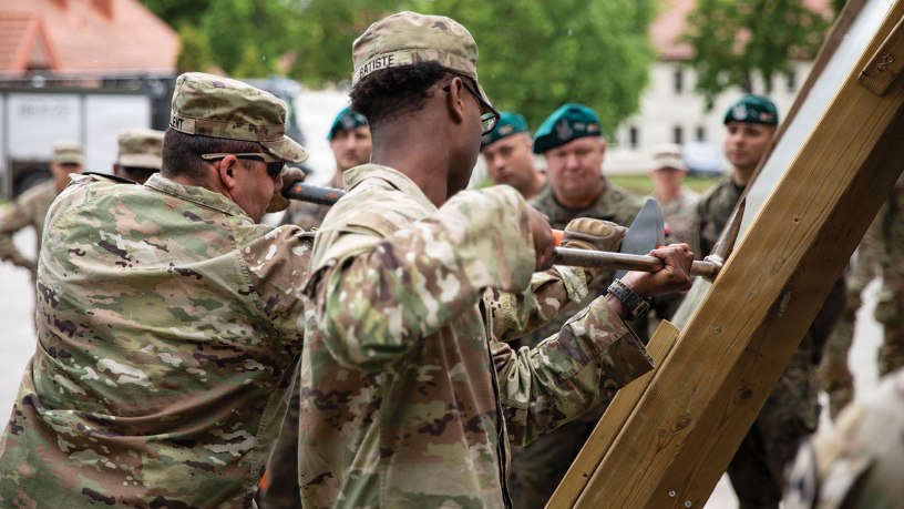 U.S. Army Soldiers of the Alpha Company, 8th Brigade Engineer Battalion, 2nd Armored Brigade Combat Team, 1st Cavalry Division, demonstrate how they would conduct a door breach alongside Polish Military Fire Service, Land Forces Training Center Orzysz, Military Unit No. 2098, Bemowo Piskie Training Area, Poland, May 28, 2026.