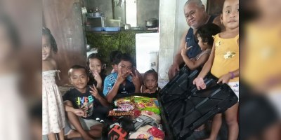 U.S. Air Force Airman 1st Class Anthony Chiakis’ family poses with donated goods and supplies. The U.S. military is dedicated to supporting civil and local authorities of Guam and the Commonwealth of the Northern Mariana Islands. (Courtesy photo)