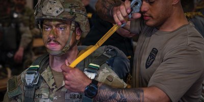 U.S. Army paratroopers assigned to the 2nd Infantry Brigade Combat Team (Airborne), 11th Airborne Division conduct pre-jump rigging inspections prior to an airborne operation during RED FLAG-Alaska 26-2 at Joint Base Elmendorf-Richardson, Alaska, June 1, 2026.