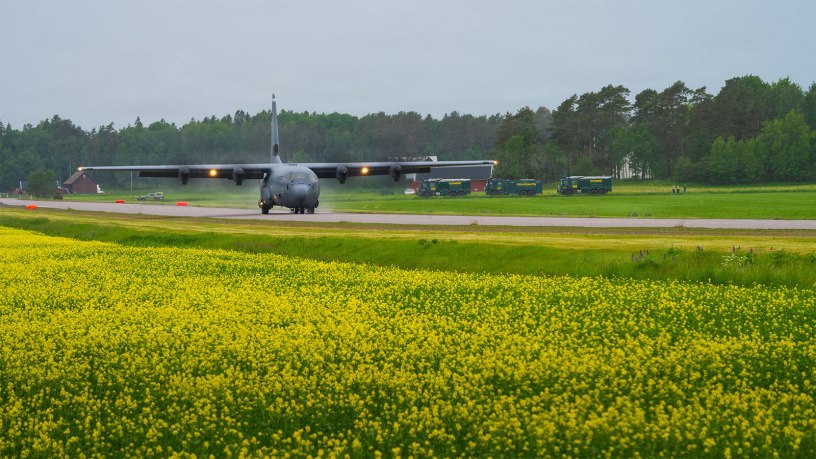A U.S. Air Force C-130J Super Hercules aircraft assigned to the 37th Airlift Squadron lands on Highway 44 near Särestad, Sweden, June 2, 2026. The narrow roadway required crews to adapt standard operating procedures while demonstrating the flexibility of Agile Combat Employment concepts. (U.S. Air Force photo by Tech. Sgt. Cynthia Belío)