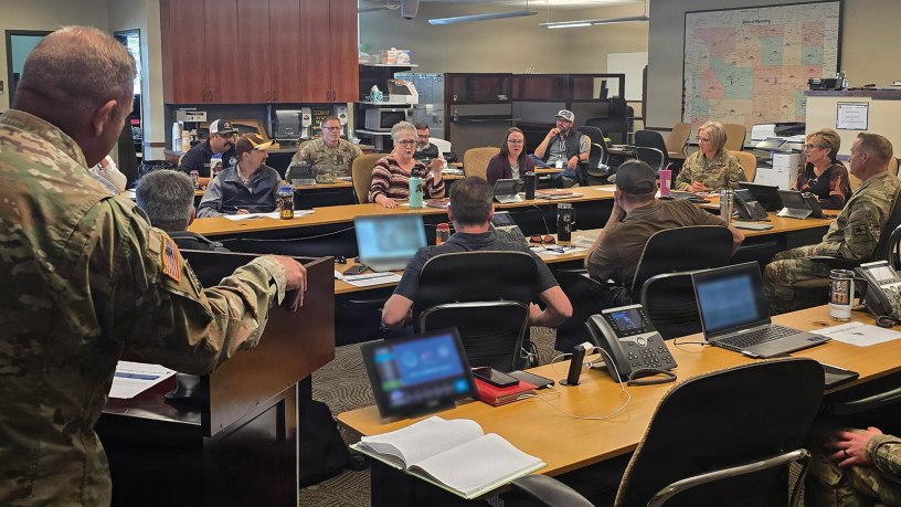 Representatives from multiple state agencies participate in a wildfire response tabletop exercise in Cheyenne, Wyoming, June 3, 2026.