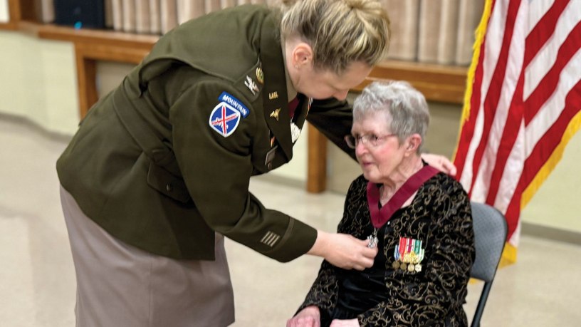 Munson Army Health Center Deputy Commander for Nursing and fellow Order of Military Medical Merit recipient Col. Gwendolyn O’Keefe presents retired Lt. Col. Susan Backs with the O2M3 Medallion during a ceremony on Fort Leavenworth, Kansas, June 4.