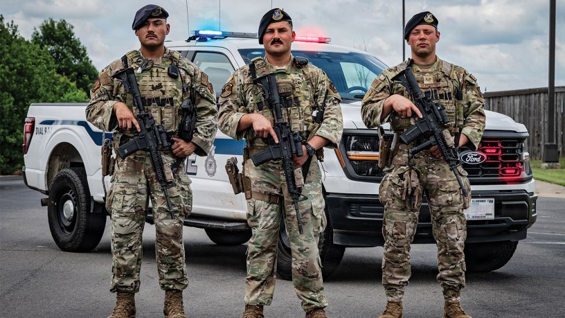 U.S. Air Force Staff Sgt. Joe Jimenez, 2nd Security Forces Squadron certified law enforcement officer, Staff Sgt. Danny Gonzalez, 2nd SFS response force lead, and Staff Sgt. Martin Schortye, 2nd SFS base defense operation center controller, pose for a photo at Barksdale Air Force Base, Louisiana, June 5, 2026.