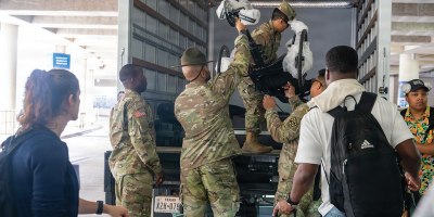 Team Army competitors load their competitor equipment into a box truck after arriving at San Antonio International Airport ahead of the 2026 Warrior Games June 8, 2026. Team Army will compete with men and women from other sister services in adaptive sporting events throughout the Games. (U.S. Army photo by Sgt. Pomare Te’o Jr.)